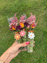 Load image into Gallery viewer, Three floral sage bundles featuring orange pink and white daisy keychains