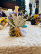 Load image into Gallery viewer, May include: A small, brown troll figurine with a white sage smudge stick, lavender, and a purple crystal. The smudge stick is surrounded by dried flowers.
