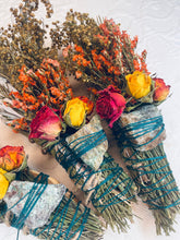 Load image into Gallery viewer, May include: Three bundles of dried herbs and flowers tied with green twine and a green stone. The bundles are decorated with dried roses and other flowers.

