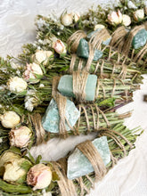 Load image into Gallery viewer, May include: A collection of dried flower bundles tied with twine and decorated with green stones. The bundles are arranged in a semi-circle shape.
