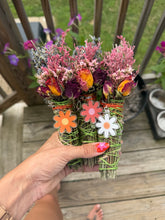 Load image into Gallery viewer, Floral sage bundles with colorful daisy charms outdoors
