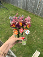 Load image into Gallery viewer, Three handmade sage bundles decorated with dried flowers and daisy keychains
